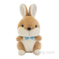 Petit oreiller de lapin brun en peluche